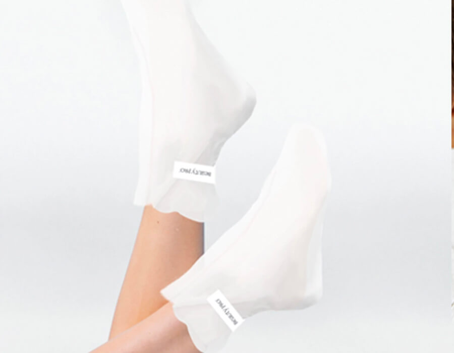 Image of the foot peel boots on a pair of feet