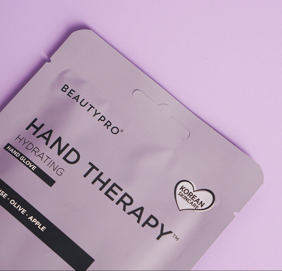 Hand therapy product packaging with 'BEAUTYPRO' branding on a purple background